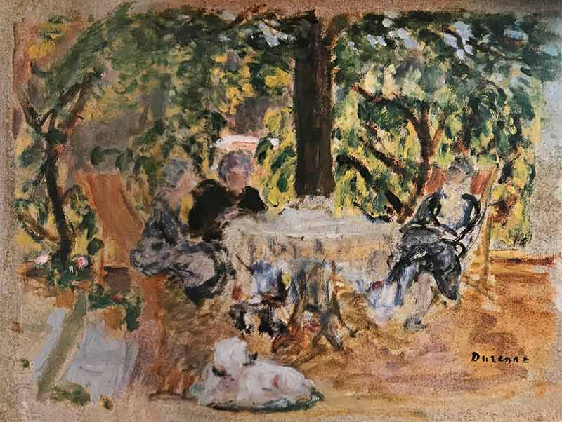 Three women sat round a circular table in a garden. Dog to foreground and mature tree to background.