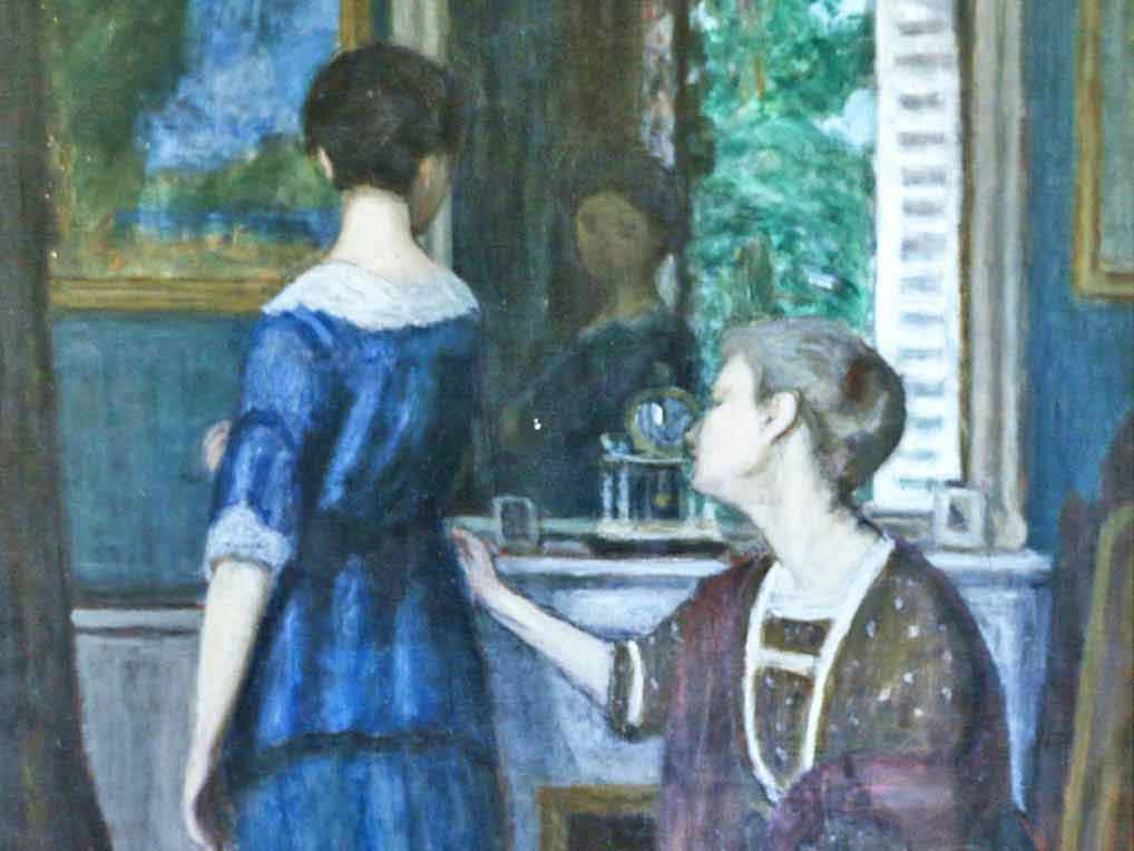Elderly woman attending to younger woman in a blue dress looking in mirror.